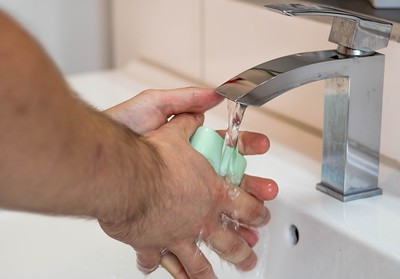 a man washing his hands