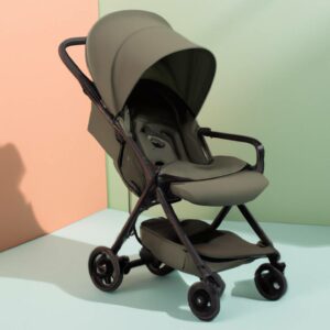 a green baby stroller