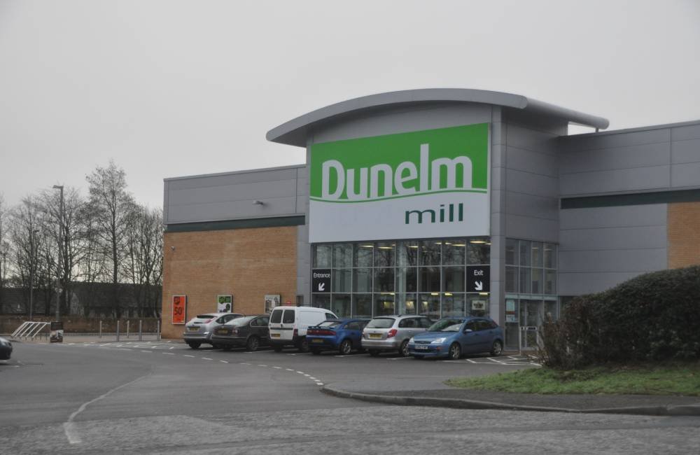 some cars parked in front of dunelm